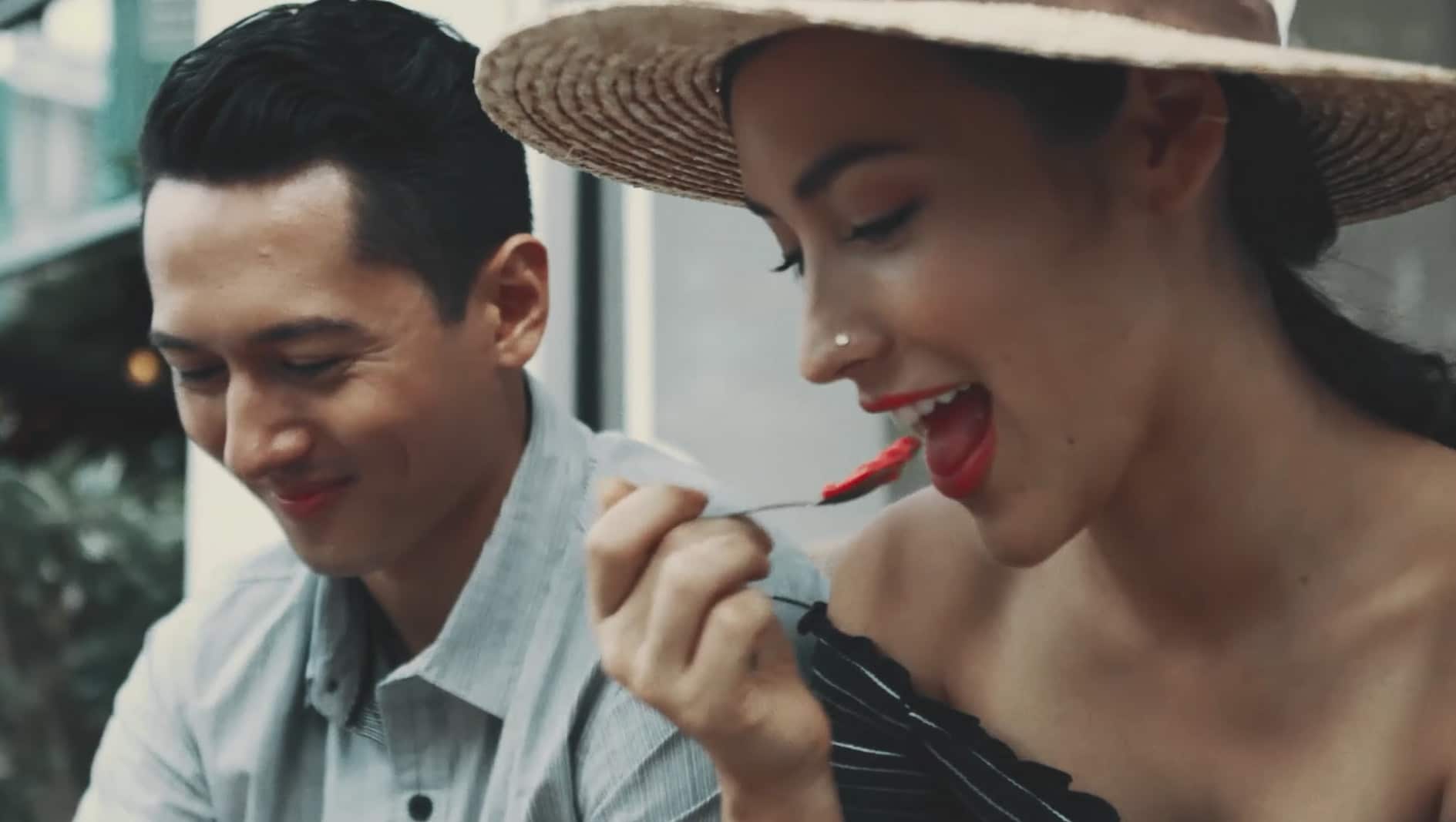 A couple enjoyjng a meal