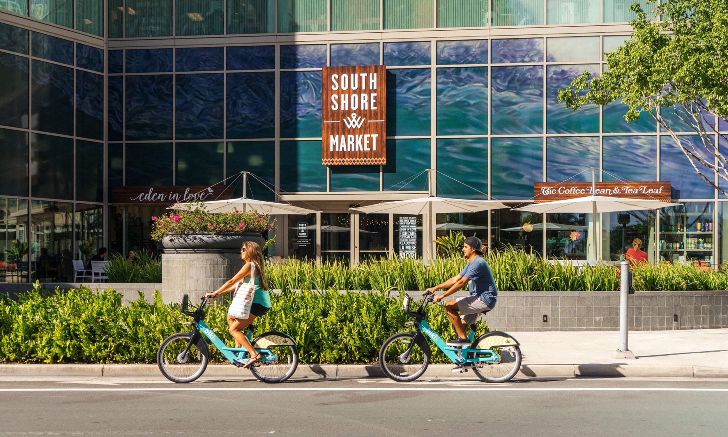 Bike riding by South Shore Market in Ward Village